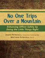 52545 - Petrocelli-Petrocelli, J.-M. - No One Trips Over a Mountain. Enhancing Officer Safety by Doing the Little Things Right 